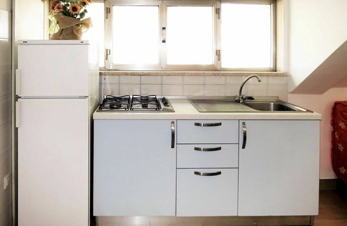 Marina di Cecina Apartment | Cosy apartment for 8 people with WIFI, A/C, pool, TV, patio and pets allowed