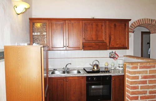 Rapolano Terme Villa | Cosy apartment in villa for 4 guests with pool, WIFI, TV, patio and parking