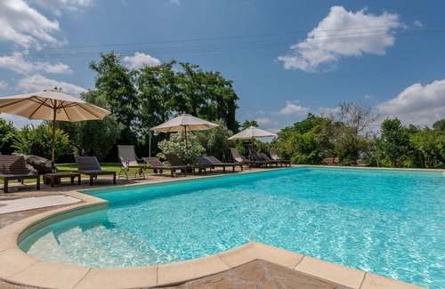 Poggi del Sasso Villa | Cosy apartment in villa for 5 guests with A/C, WIFI, pool, TV, patio, pets allowed and parking