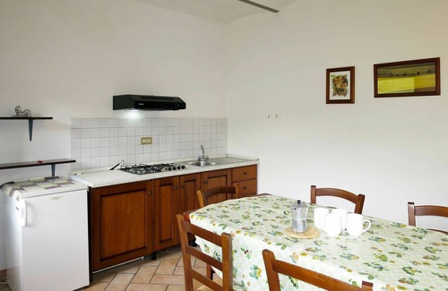 Lisciano Niccone Villa | Cosy apartment in villa for 4 people with WIFI, pool, patio, pets allowed and parking