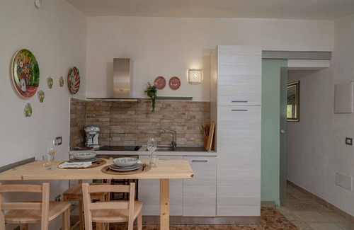 Eden Beach Villa | Cosy apartment in villa for 3 people with pool, WIFI, A/C, TV, patio and parking