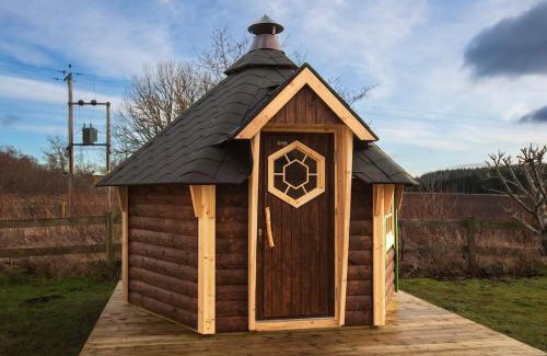 Alness House | Cosy Shepherds Hut with hot tub in the Scottish Highlands