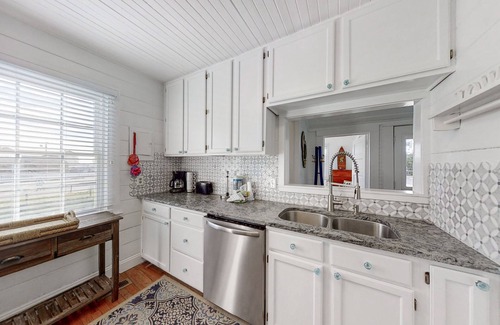 Atlantic Beach Cottage | Cottage in the heart of Atlantic Beach with ocean views, two decks, WiFi, & W/D