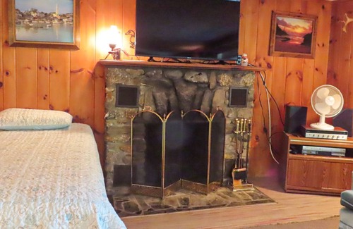Meredith Cottage | Cottage with beach access, a fireplace, yard, grill, cable & golf nearby