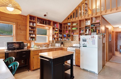 Boyne City House | Cottage with lake views, private dock & firepit - near public boat launch