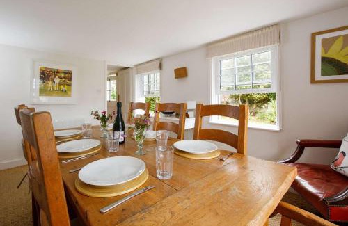 Sidlesham House | Country cottage in pretty village quay views