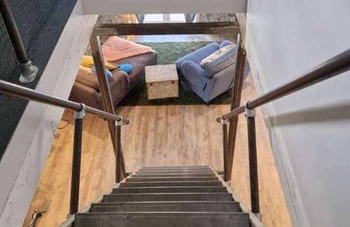 Borlange Apartment | Countryside, two-level studio, built in an old barn.
