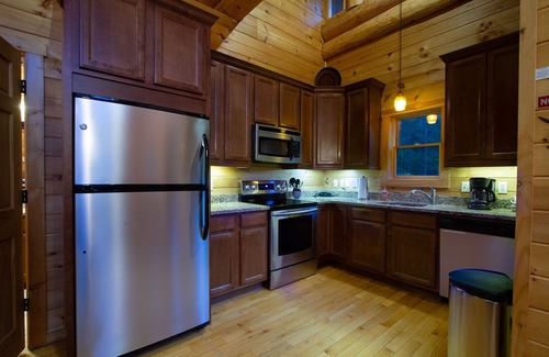 Almond Cabin | Couple's private escape mountain cabin with fireplace and hot tub on deck