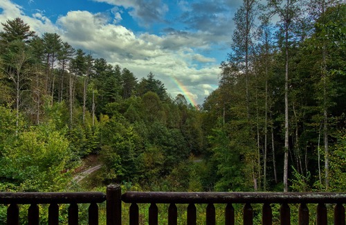 Almond Cabin | Couple's private escape mountain cabin with fireplace and hot tub on deck