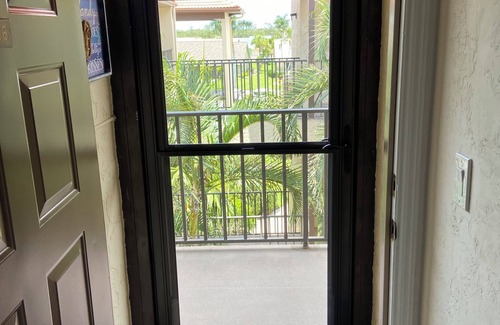 Iona Condo | Couples' lake-view condo perfectly located near beaches, dining & stores!