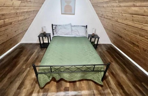Albertville House | Coyote Tiny Luxury Cabin on Lake with Arcade
