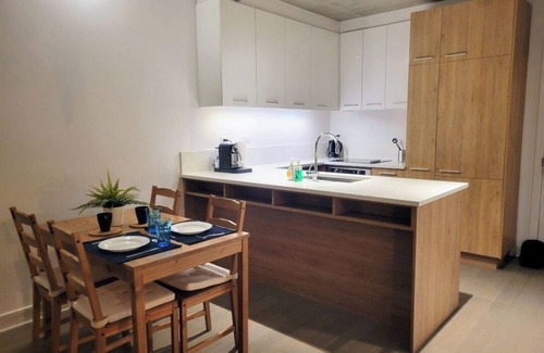 Griffintown Condo | Cozy 1-bedroom condo in charming Griffintown with rooftop pool, fitness room