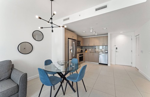 Doral Condo | Cozy 1-bedroom condo with WiFi, fitness room in enchanting Downtown Doral