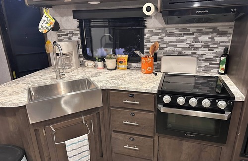 Greenville House | Cozy 1-bedroom RV on private stocked pond. Glamping in Greenville
