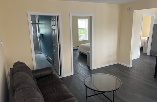 Guild Apartment | Cozy 2-bedroom apt-1 in Lakes Region with AC, WiFi, Pet friendly 2 queen beds