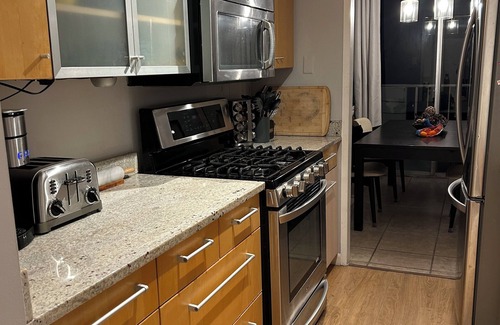 Alexandria West Condo | Cozy 2-bedroom condo in Alexandria w/fast WiFi, gym, assigned garage parking!