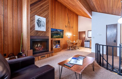 Whitefish Condo | Cozy 2 bedroom condo with wood burning fireplace, private deck and pool/hot tub access