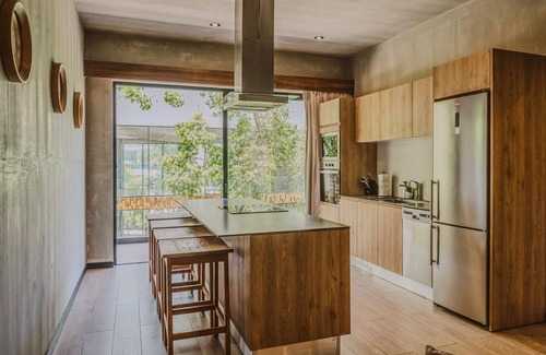Tulum Condo | Cozy 2-bedroom condo with rooftop pool and WiFi in downtown Tulum
