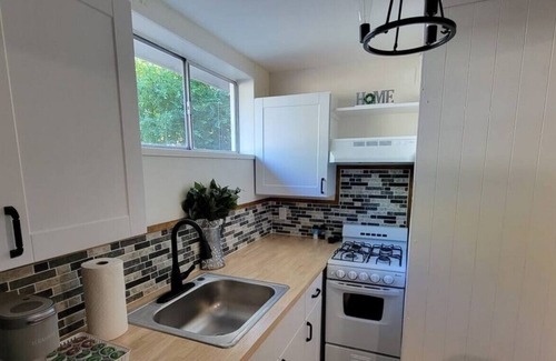 Swiss Manor House | Cozy 2 bedroom townhome. Great Central Location!