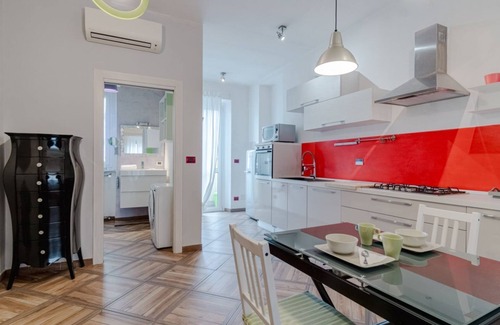San Paolo Apartment | Cozy 72 sqm apartment in Turin, perfect for 4 guests, located on the fourth floor of an elegant 1930s building (no elevator). It features two balconies with bright views. The property is in a lively and well-served area, just steps away from shops, resta