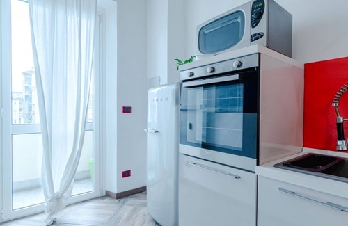 San Paolo Apartment | Cozy 72 sqm apartment in Turin, perfect for 4 guests, located on the fourth floor of an elegant 1930s building (no elevator). It features two balconies with bright views. The property is in a lively and well-served area, just steps away from shops, resta