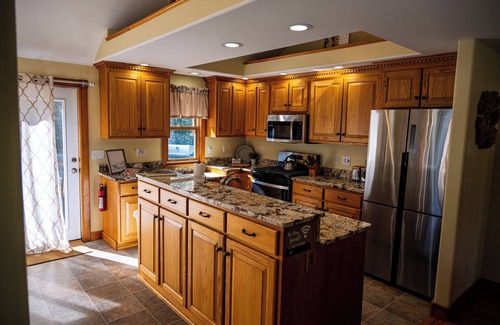 Gilford House | Cozy and fully renovated 4-bedroom rental property, available for you to enjoy.n