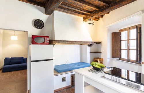 Castagneto Carducci Apartment | Cozy apartment of about 35sqm located on the ground floor of a renovated period building, without elevator (steps to access it). The accommodation is located in the historic center of Castagneto Carducci, a medieval village named after the well-known Ita