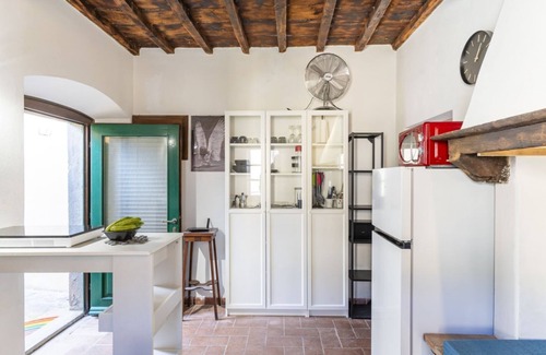Castagneto Carducci Apartment | Cozy apartment of about 35sqm located on the ground floor of a renovated period building, without elevator (steps to access it). The accommodation is located in the historic center of Castagneto Carducci, a medieval village named after the well-known Ita