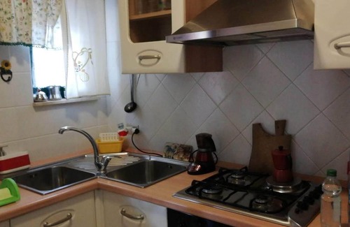 Milianni Apartment | Cozy apartment a stone's throw from the sea, with private parking space