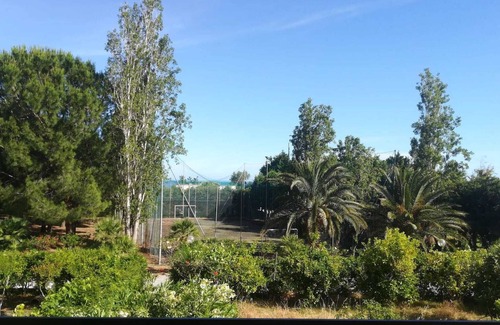 Milianni Apartment | Cozy apartment a stone's throw from the sea, with private parking space