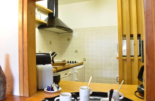 Meribel Centre Apartment | Cozy apartment for 5, central Méribel, south-facing balcony, divided living area, ski locker