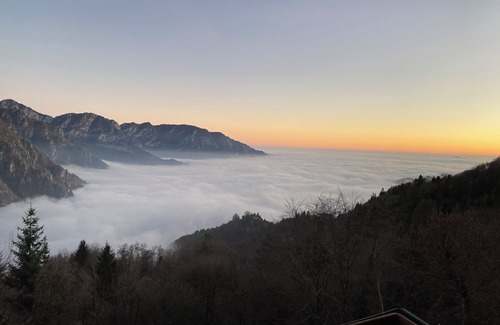Treviso Bresciano Apartment | Cozy apartment with garden and private parking in Baita at 1000 meters