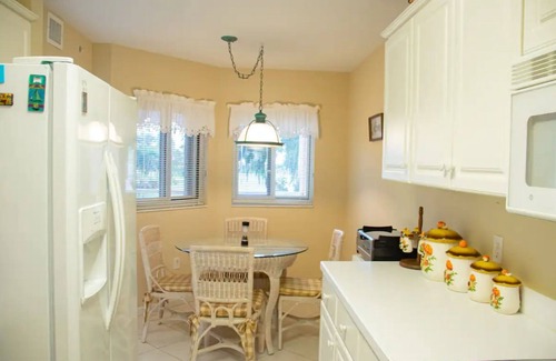 Fort Pierce Shores Condo | Cozy Beach Condo w/Workspace, Great WiFi, Paddle Boards, Canoe, Gym, Pool & Spa