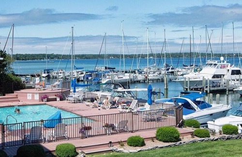 Charlevoix Condo | Cozy Boat House II Lake Charlevoix: Amazing Views and Pool