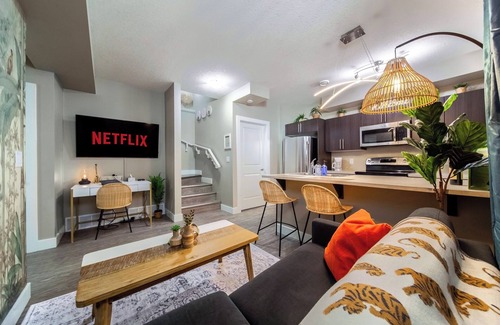 Southeast Edmonton House | Cozy Boho Jungle Themed Suite w/Double Queen Beds