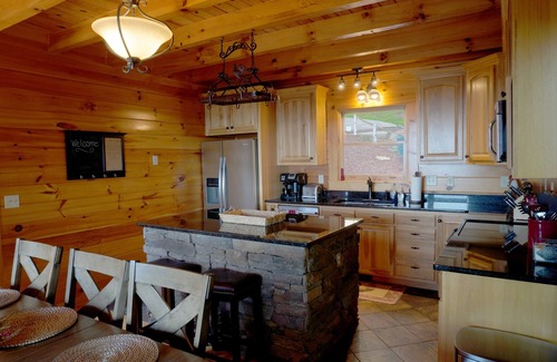 Lake Lure Cabin | Cozy Cabin w/ Breathtaking Mountain view, hot tub, fire fit, game room & luxury.
