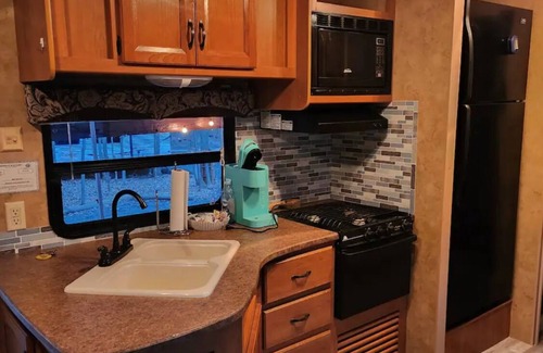 Watkins Glen RV Rental | Cozy Camper with private hot tub The Hideout unit 1