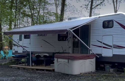 Watkins Glen RV Rental | Cozy Camper with private hot tub The Hideout unit 1