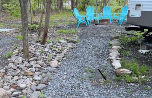 Watkins Glen RV Rental | Cozy Camper with private hot tub The Hideout unit 1