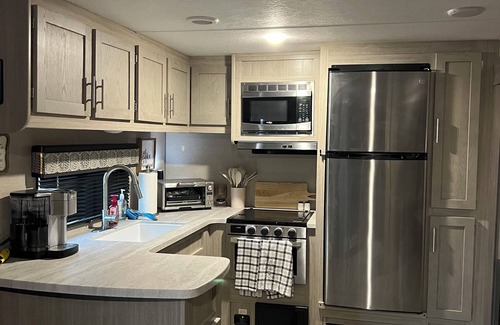 Concord RV Rental | Cozy campground with WiFi and AC. Walk to the Charlotte motor speedway.