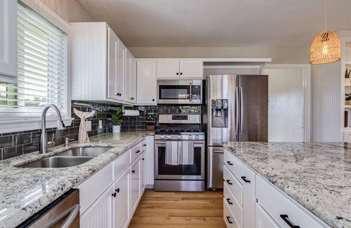 Jamaica Beach House | Cozy Canal Home 4 Min Dr to Beach + Outdoor Space