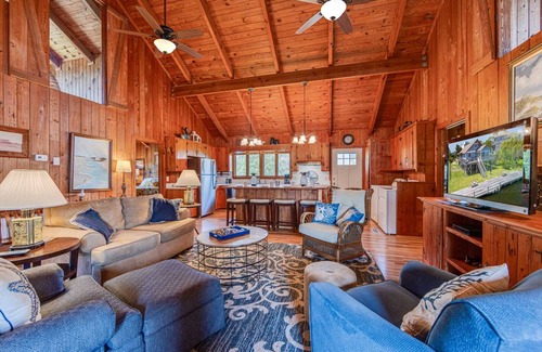 Brigands' Bay House | Cozy Canalfront Cottage w/Hot Tub, Private Boat Dock, Smart TVs, Screened Porch