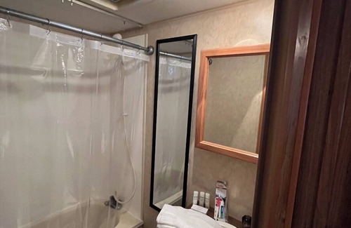Higgins Lake House | Cozy Charm on Wheels. Remodeled Camper.