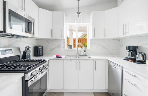 Lake Worth House | Cozy, clean home with heated saltwater pool, game room, bikes, lake community!
