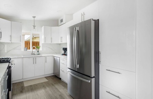 Lake Worth House | Cozy, clean home with heated saltwater pool, game room, bikes, lake community!