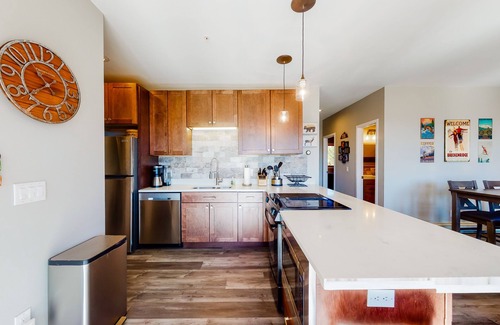 Wildernest Condo | Cozy condo with fireplace, pool, & hot tub - near trails