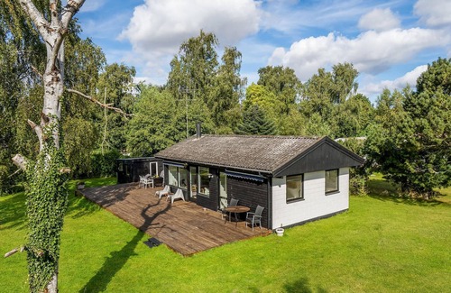 Holbaek House | Cozy cottage located on a large fenced plot.