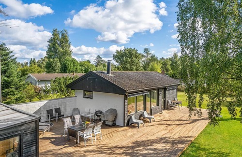 Holbaek House | Cozy cottage located on a large fenced plot.