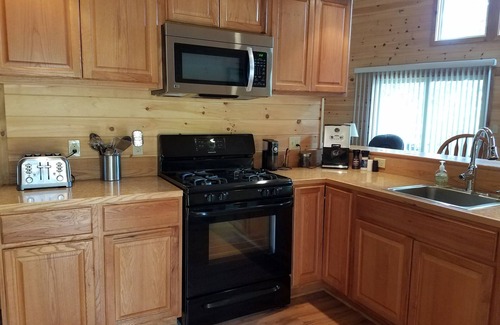 Southwest Harbor House | Cozy cottage nestled in the woods with walking distance to town.
