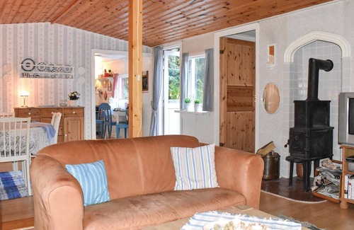 Tjornarp House | Cozy cottage with fireplace on the edge of the forest.